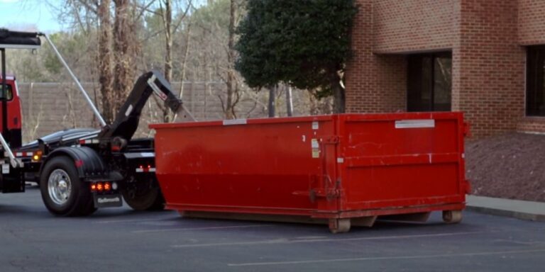 large red 30 cu yard dumpster roll off in Des Moines Iowa